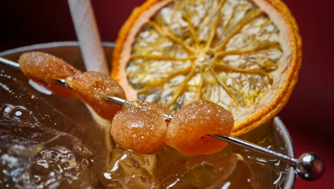 Tamarind cocktail with citrus and tamarind candy